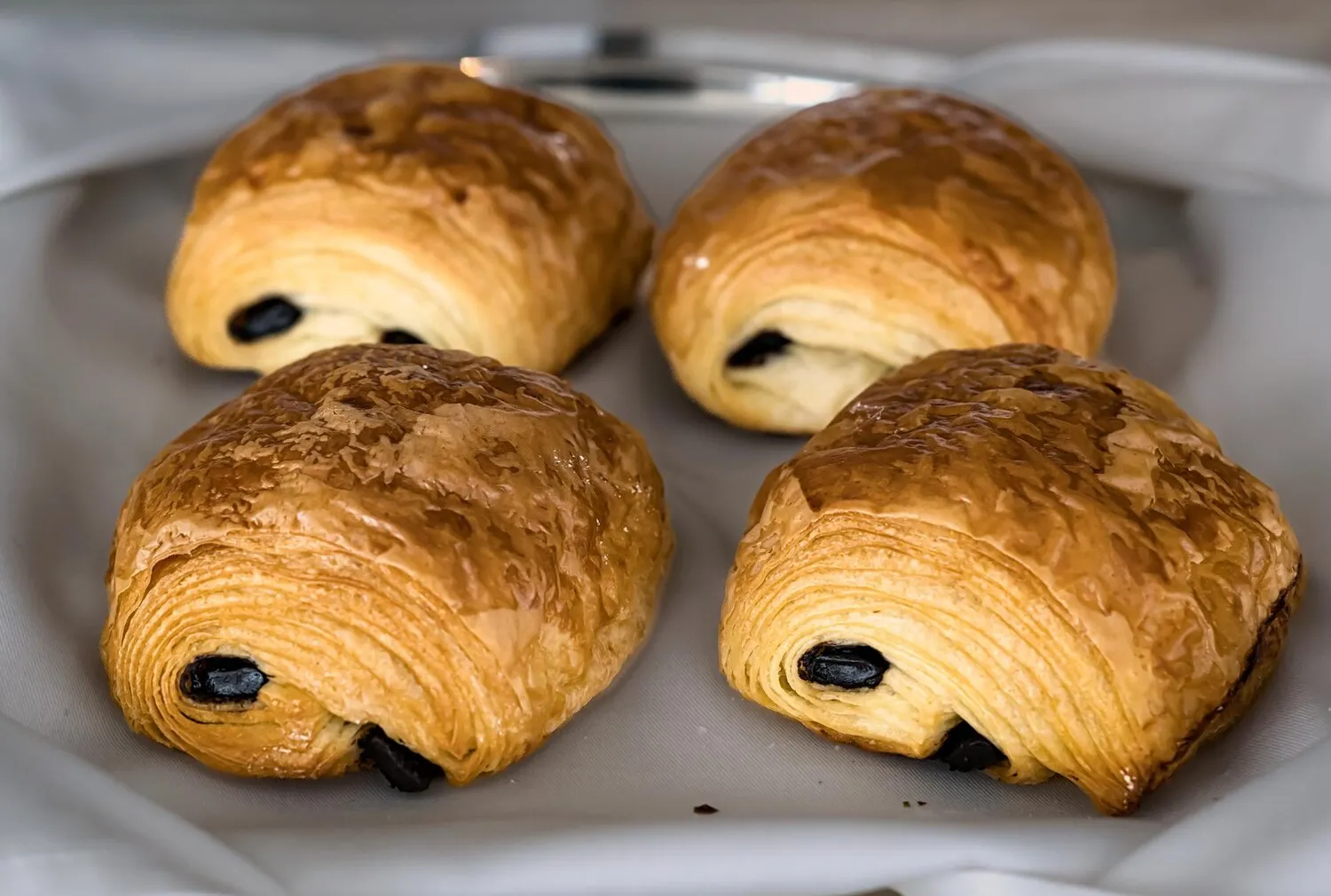 Pain au Chocolat Pain au Chocolat https://4kym48m6w0dj35od.public.blob.vercel-storage.com/dishes/internal/pain-au-chocolat-1763988373236.webp